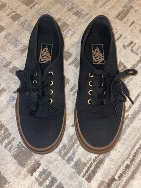 Vans Black Canvas Sneakers with Brown Gum Outsole and Gold Eyelets